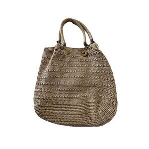 The Sak Crochet Purse beige With Gold Metallic Thread Accents on handles flaw